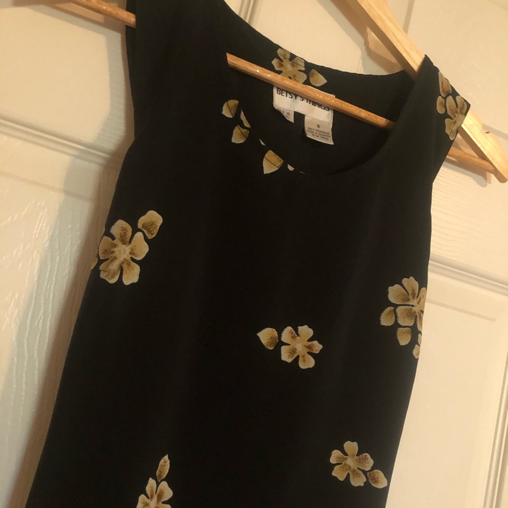 Sick vintage 90s maxi floral dress with leopards at bottom by Betsy’s Things.